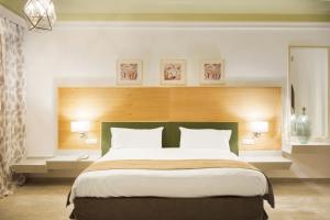 Postel nebo postele na pokoji v ubytování Hotel Riu Tikida Palmeraie - All Inclusive