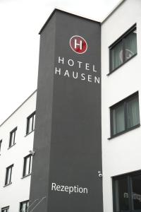 a building with the hotel hazard sign on it at Hotel Hausen Obertshausen Frankfurt in Obertshausen