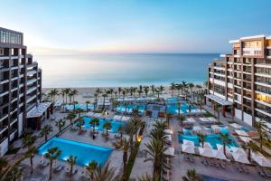 an aerial view of the hotel and the beach at Garza Blanca Resort & Spa Los Cabos in Cabo San Lucas