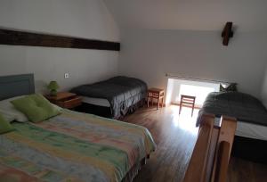 Katil atau katil-katil dalam bilik di Popote et Polochon