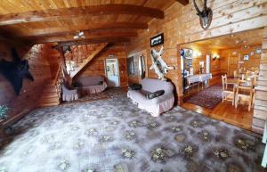 an overhead view of a living room in a log cabin at Hotel Complex Okolitsa in Uznezya