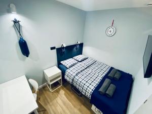 Postel nebo postele na pokoji v ubytování Thruster - Rooms, Kitchen, Chill-Out Zone-Netflix, Lobby-Netflix