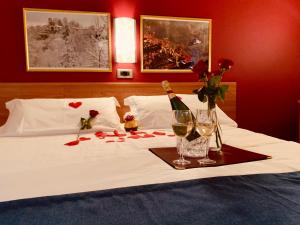 Ένα ή περισσότερα κρεβάτια σε δωμάτιο στο Hotel Erbaluce