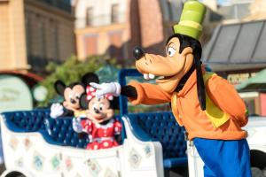 a cartoon figure of mickey mouse in a parade at Holiday Inn Express & Suites S Lake Buena Vista by IHG in Kissimmee