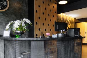 Kuchyň nebo kuchyňský kout v ubytování Castro's Hotel