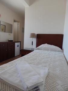 Cama o camas de una habitación en Hotel Timbó