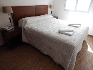Cama o camas de una habitación en Hotel Timbó