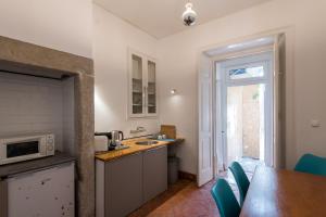 Køkken eller tekøkken på Lost Lisbon :: Avenida House