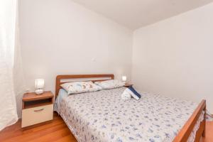 Postel nebo postele na pokoji v ubytování House Quercus