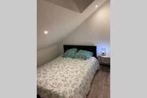 Ein Bett oder Betten in einem Zimmer der Unterkunft Urban Loft