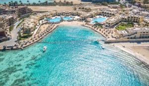 an aerial view of a beach with a resort at Sunny Days Palma De Mirette Resort & Spa in Hurghada
