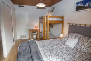 Krevet ili kreveti na kat u jedinici u objektu JANDRI 4 Appartement 6 personnes -38860 Les 2 Alpes - Pied des pistes