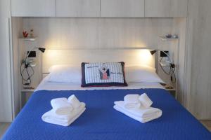 Postel nebo postele na pokoji v ubytování B&B LaMarina