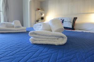 Postel nebo postele na pokoji v ubytování B&B LaMarina
