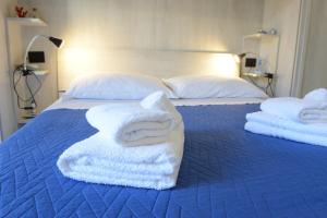 Postel nebo postele na pokoji v ubytování B&B LaMarina