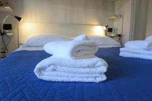 Postel nebo postele na pokoji v ubytování B&B LaMarina