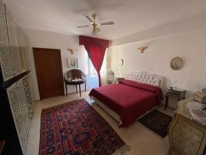 Postel nebo postele na pokoji v ubytování B&B LARAZZO