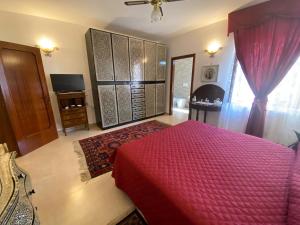 TV a/nebo společenská místnost v ubytování B&B LARAZZO