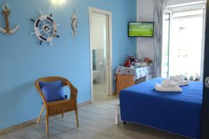 Postel nebo postele na pokoji v ubytování B&B LaMarina