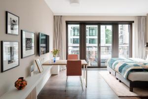 Postel nebo postele na pokoji v ubytování Numa Berlin Nook
