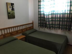 Postel nebo postele na pokoji v ubytování Bertur Peñismar + 37 fotografií