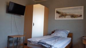 Postel nebo postele na pokoji v ubytování Ferienwohnung Jürgen Brill