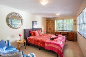 Rúm í herbergi á Villa Seaside Boca Sami