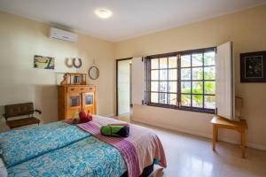 Rúm í herbergi á Villa Seaside Boca Sami