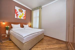 Posteľ alebo postele v izbe v ubytovaní Residence Masna