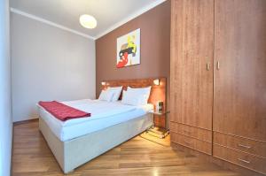 Posteľ alebo postele v izbe v ubytovaní Residence Masna