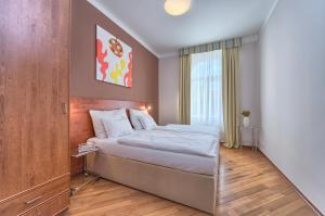 Posteľ alebo postele v izbe v ubytovaní Residence Masna