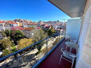 uma varanda com vista para a cidade em Lisbon City Hotel by City Hotels em Lisboa