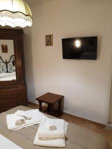TV a/nebo společenská místnost v ubytování Kalimaka Bed & Breakfast