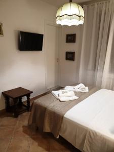 Postel nebo postele na pokoji v ubytování Kalimaka Bed & Breakfast