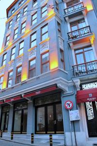 a large building on the corner of a street at IQ Hotel Galatasaray in Istanbul