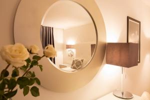 Postel nebo postele na pokoji v ubytování Veneza Hotel