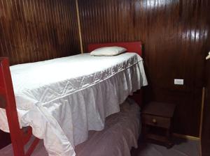 Lova arba lovos apgyvendinimo įstaigoje Cabañas cunco