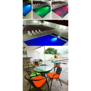een collage van foto's van een tafel en stoelen en een zwembad bij Manta Airport Hotel in Manta