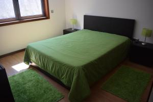 Postel nebo postele na pokoji v ubytování Casa da Batoca - Rossas