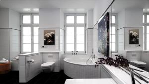Een badkamer bij Boutique Suites Heidelberg Alte Zigarrenmanufaktur