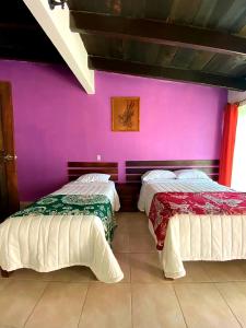 Cama o camas de una habitación en La Finca del Abuelo Teotihuacan