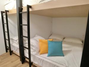Postel nebo postele na pokoji v ubytování Nest Home