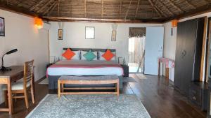 Ένα ή περισσότερα κρεβάτια σε δωμάτιο στο Agonda Villas