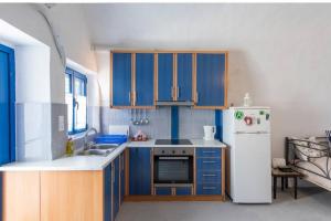 Kuchyň nebo kuchyňský kout v ubytování easy going santorini house + 16 fotografií