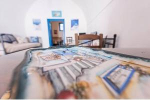 Posteľ alebo postele v izbe v ubytovaní easy going santorini house
