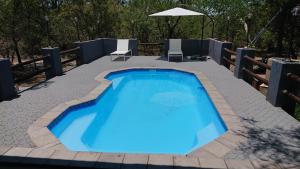 Πισίνα στο ή κοντά στο SVH Bush Lodge