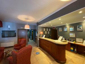 TV a/nebo společenská místnost v ubytování Hotel Clari