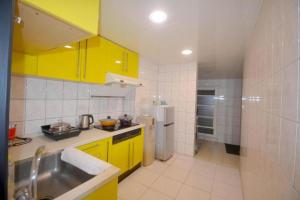 Kuchyň nebo kuchyňský kout v ubytování Nest Home