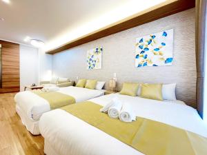 Voodi või voodid majutusasutuse HOTEL CLA-SS HIROSHIMA-DOBASHI toas