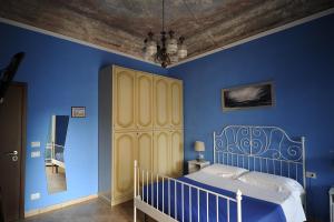 Katil atau katil-katil dalam bilik di B&B Calcio Storico